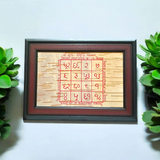 A Handmade Sukh Samridhi Yantra on Bhojpatra with a frame, designed to bring prosperity, wealth, and happiness to the worshipper's life