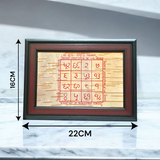 A Handmade Sukh Samridhi Yantra on Bhojpatra with a frame, designed to bring prosperity, wealth, and happiness to the worshipper's life