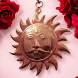 A Wall Hanging Sun made of pure copper with a golden finish, designed to protect from Vaastu dosh, Shani dosh, and accidents, while bringing positive energy and prosperity to your home or office