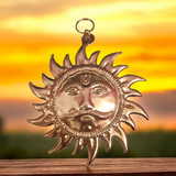 A Wall Hanging Sun made of pure copper with a golden finish, designed to protect from Vaastu dosh, Shani dosh, and accidents, while bringing positive energy and prosperity to your home or office