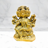 A beautiful 4-inch Gayatri Mata brass murti, gold-plated, with intricate craftsmanship, representing wisdom, knowledge, and spiritual enlightenment.