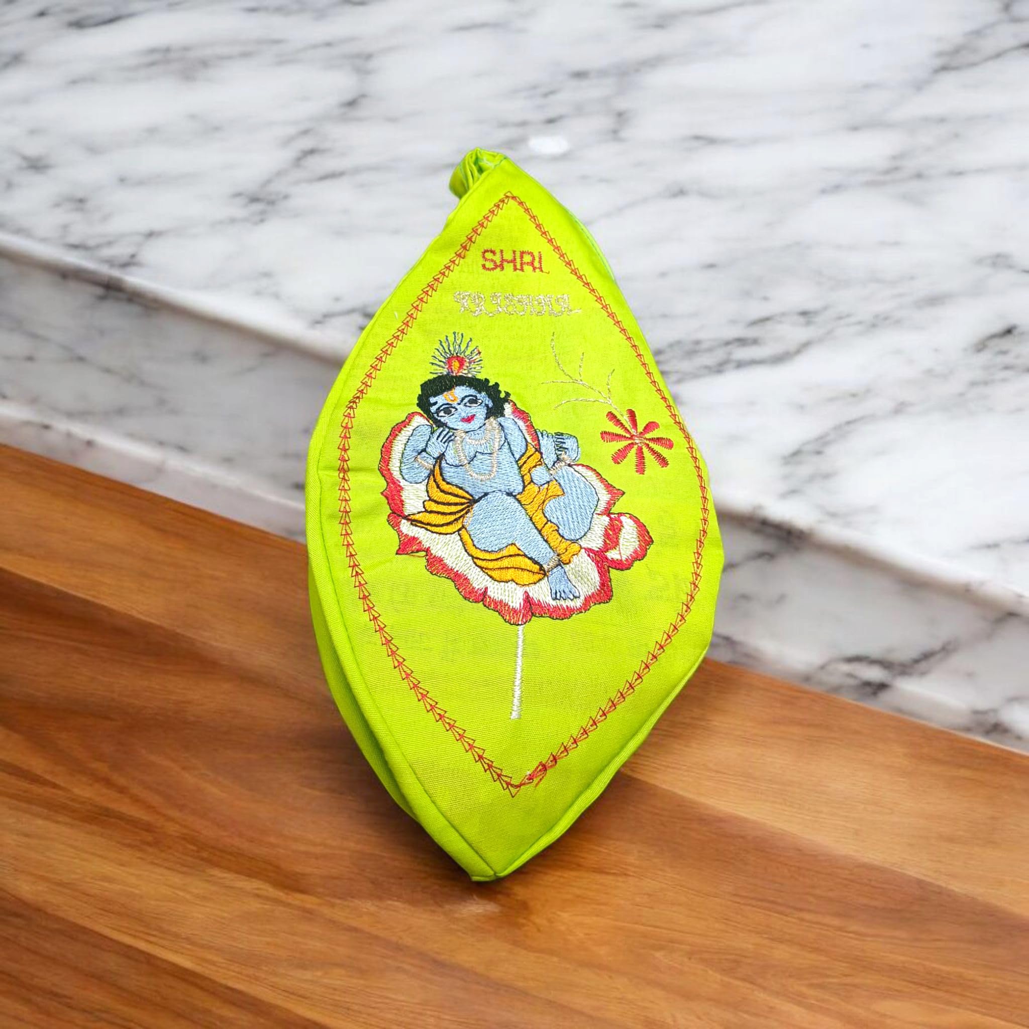 A beautifully crafted Laddu Gopal Gaumukhi Bag designed for storing Jaap Mala and other devotional items. The bag features a spiritual Gaumukhi design and is made from durable, high-quality fabric.