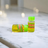 A bottle of Kewra Attar (4ML), alcohol-free, ideal for worship and spiritual practices, with a floral fragrance