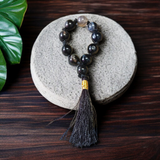 A lab-certified natural black Sulemani finger mala with 9+1 round 8mm Sulemani Hakik beads, ideal for meditation, chanting, and protection