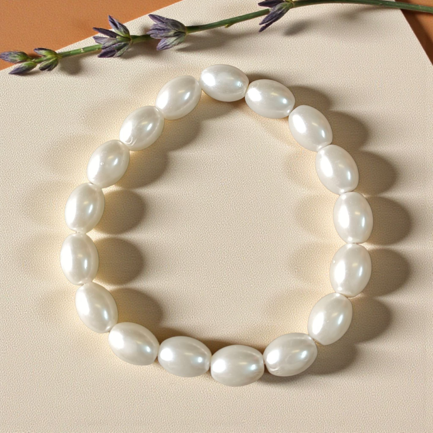 A lab-certified natural pearl bracelet featuring 10-11mm white pearls, elegantly strung together for spiritual and fashionable wear