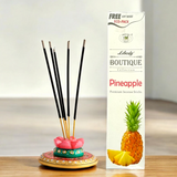 A pack of pineapple incense sticks in an economy pack, with a free gift included inside. The sweet, tropical scent enhances relaxation and purifies the air.