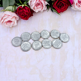 A sacred Ranga Rahu Yantra Sikka coin engraved with the Rahu Yantra, used for spiritual protection and remedies as per Lal Kitab and Vedic astrology