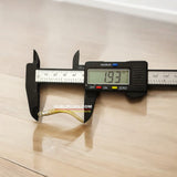 A silver pendant featuring an authentic owl nail (Ullu ke Nakhun) designed to attract luck, wealth, and prosperity.