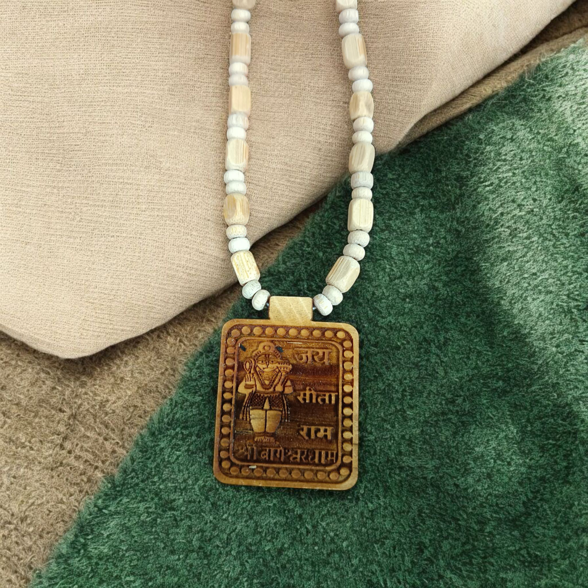 Bageshwar Dham Jai Sita Ram Tulsi Mala, displaying the Tulsi beads and an inscription of Jai Sita Ram