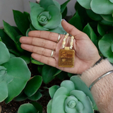 Bageshwar Dham Jai Sita Ram Tulsi Mala, displaying the Tulsi beads and an inscription of Jai Sita Ram