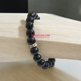 Black Agate Bracelet with 8MM natural beads, lab certified, stretchable design, offering protection, grounding, and courage.