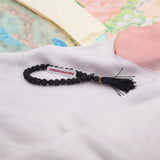 Black Rudraksha Mala 27+1 Beads, 6MM 5 Mukhi Rudraksha Jaap Mala by Gurupujan, ideal for chanting and meditation while traveling or at work.