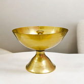 Brass Akhand Jyot diya with heavy base for steady flame, designed for pooja and aarti rituals, creating a spiritual and peaceful environment.