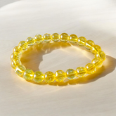 Close-up image of Natural Citrine Diamond-cut Bracelet with 8mm stretchable beads, ideal for success, prosperity, and manifestation