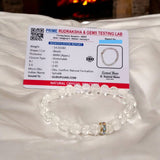 Crystal Sphatik Bracelet with natural transparent 7MM beads, lab certified, stretchable design, promoting peace, clarity, and positive energy.