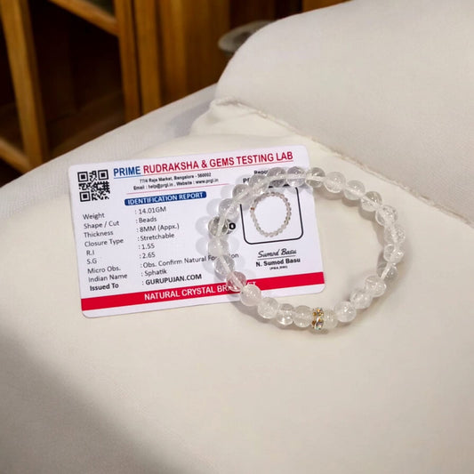 Crystal Sphatik Bracelet with natural transparent 7MM beads, lab certified, stretchable design, promoting peace, clarity, and positive energy.