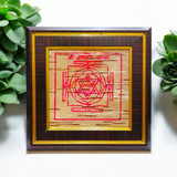 Ganpati Yantra inscribed on Bhojpatra, framed beautifully, designed for spiritual rituals and Vastu remedies.