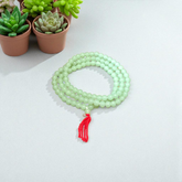 Green Moti Mala with 108+1 beads for meditation, emotional healing, and spiritual practice