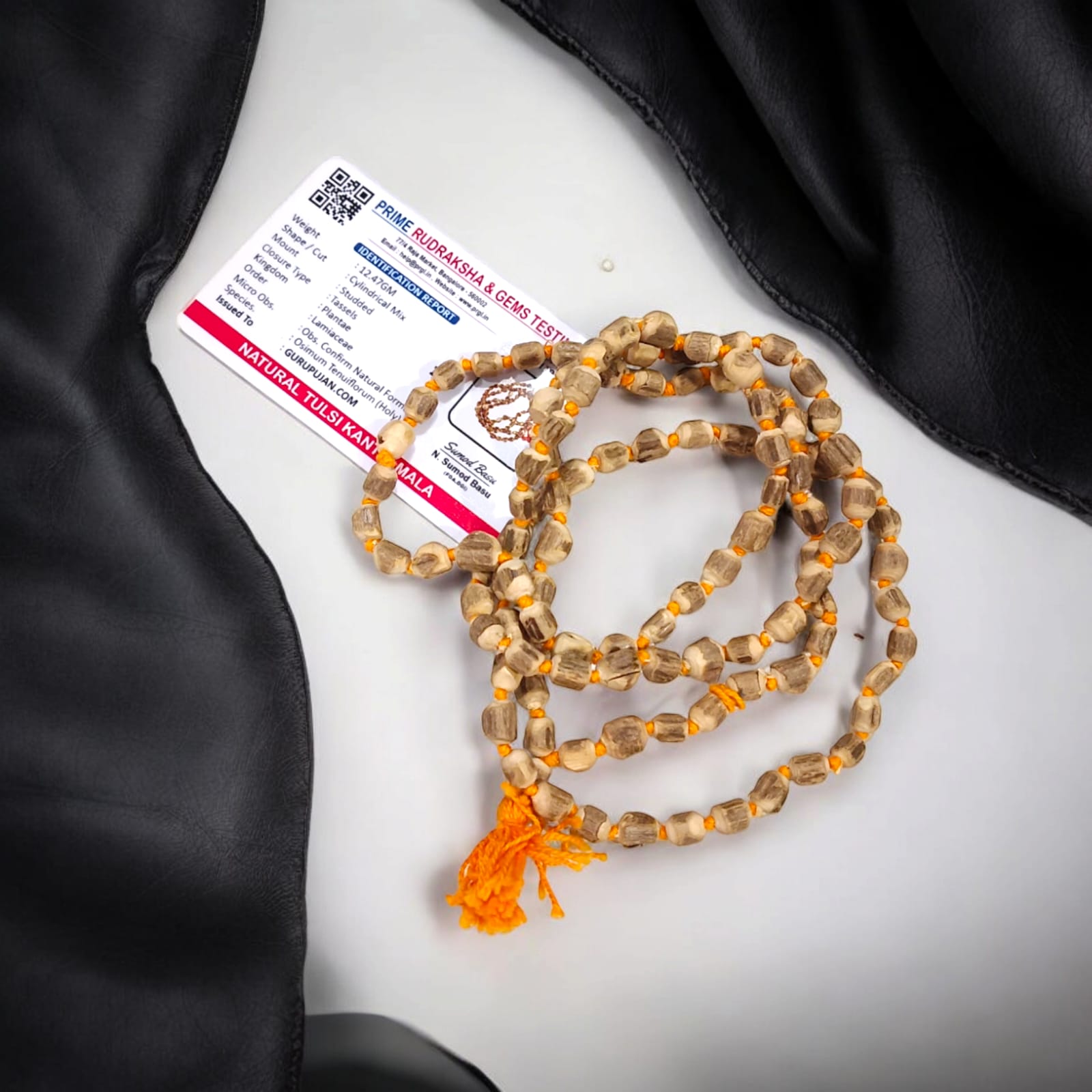 Handmade Natural Tulsi Kanthi Mala with barrel-shaped beads sourced from Vrindavan, ideal for chanting and daily wear to enhance spiritual devotion.