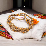 Handmade Natural Tulsi Kanthi Mala with barrel-shaped beads sourced from Vrindavan, ideal for chanting and daily wear to enhance spiritual devotion.