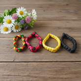 Handmade thread bracelet set of 4 in red, yellow, black, and multicolor for men and women, symbol of protection and spirituality by Gurupujan