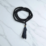 Image of Lab Certified Black Hakik Mala with 108+1 beads (6MM) for spiritual protection and meditation from Gurupujan