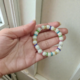 Image of Original Pearl Bracelet with 8MM natural pearls on a stretchable thread, lab-certified and suitable for astrological benefits