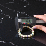 Image of Original Pearl Bracelet with 8MM natural pearls on a stretchable thread, lab-certified and suitable for astrological benefits