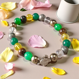 Image of a Money Magnet Bracelet made of 8mm natural gemstone beads, stretchable design, ideal for attracting wealth and prosperity