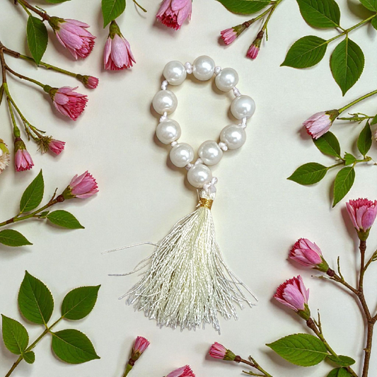 Image of a Natural Pearl Finger Mala with 9+1 lab-certified Moti beads, designed for meditation, peace, and emotional healing