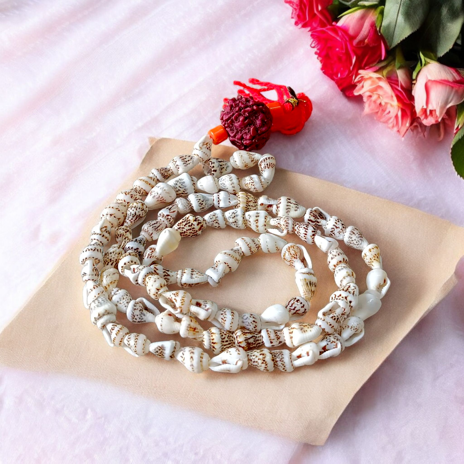 Image of lab-certified Shankh Mala made from natural conch shells, ideal for chanting and spiritual practices