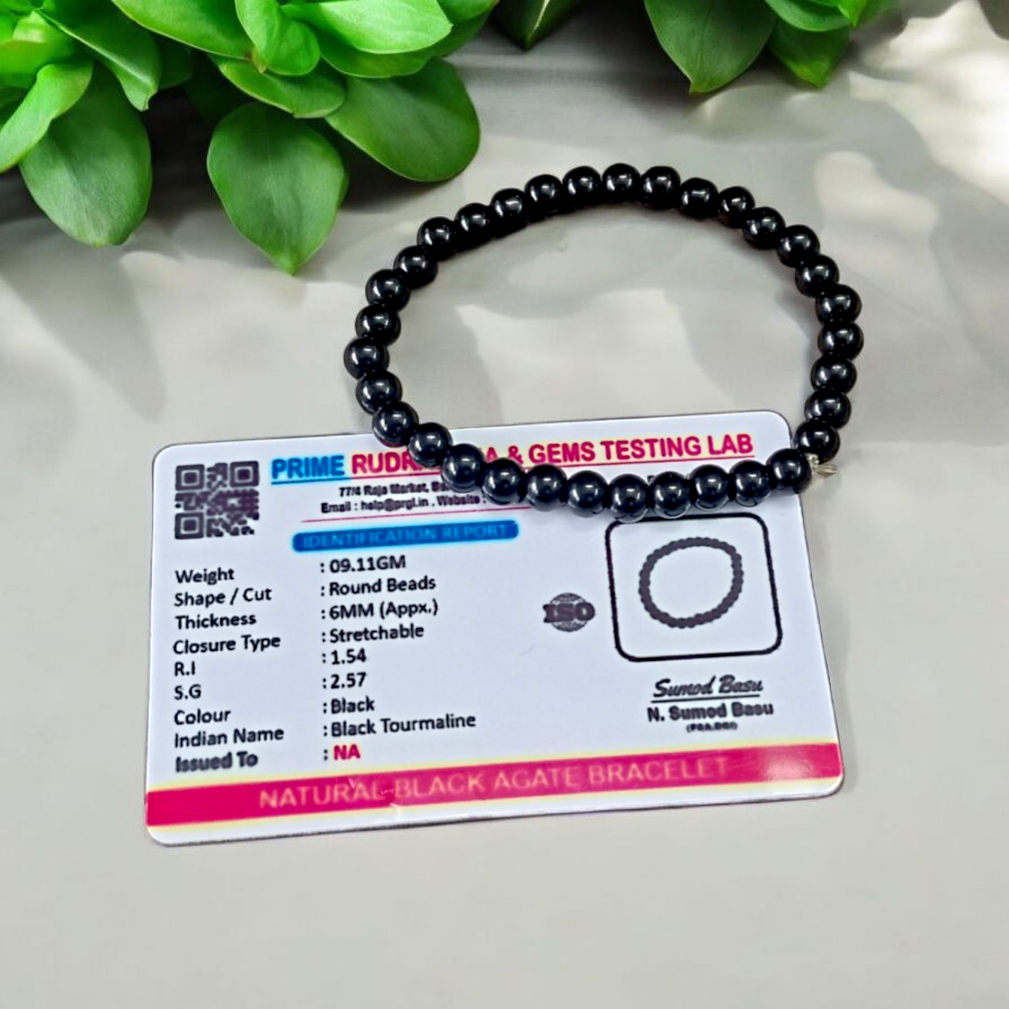 Image showing a premium Natural Black Agate Bracelet made with 6mm smooth round beads on a stretchable elastic band
