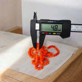 Image showing an energized Orange Monga Mala with 108+1 coral beads, ideal for Mars-related spiritual remedies