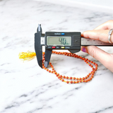 Lab certified 5 Mukhi Rudraksha Mala with 108+1 beads, 4mm size, for meditation, stress relief, and mental clarity