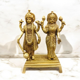 Lakshmi Narayan Standing Pose Pure Brass Idol, intricately crafted with Lord Vishnu and Goddess Lakshmi in a divine standing posture, made from high-quality brass.