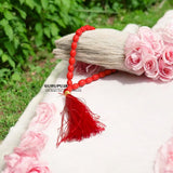 Lal Moonga Mala 27+1 beads made from natural Red Coral, designed to spread a positive aura and enhance emotional stability.