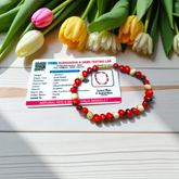 Natural Red and White Gunja seed bracelet with approx. 5mm beads, stretchable and lab certified, displayed on a white background