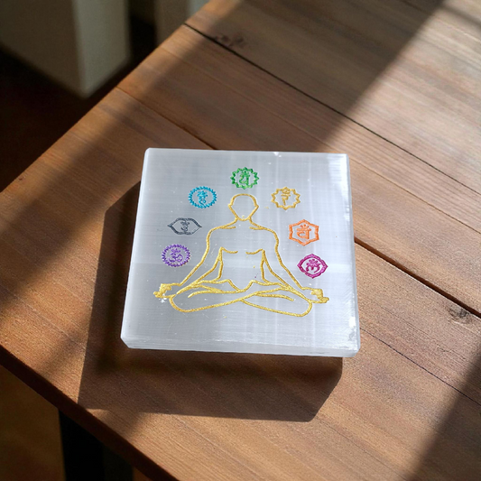 Natural lab-certified selenite charging plate with engraved 7 chakra symbols for crystal cleansing, meditation, reiki, and pooja rituals