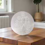 Natural selenite 7 chakra meditation plate used for crystal charging, Reiki healing, chakra balancing, and spiritual décor