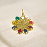 Navratna Locket with Shri Yantra – Nine gemstones pendant with sacred Shri Yantra symbol, gold-plated chain, offering spiritual protection, prosperity, and divine blessings.