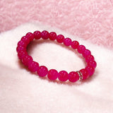 Pink Agate Bracelet with 8MM natural beads, lab certified, stretchable design, promoting emotional healing and harmony.