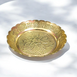 Pure brass flower design plate for temple use, ideal for holding lamps, idols, and religious offerings during pooja ceremonies.