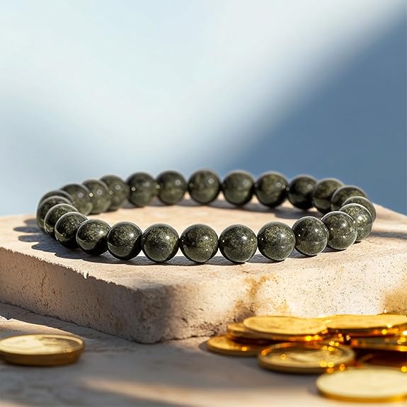 Raw Pyrite Bracelet with 6-7MM natural golden pyrite beads, stretchable and handmade, placed on a white background.