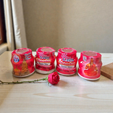 Red chandan paste tika container used for tilak and puja rituals