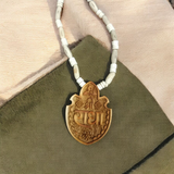 Shri Radha Tulsi Wood Locket with Tulsi Mala, promoting devotion, protection, and spiritual connection with Lord Krishna and Radha