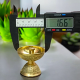 Small Brass Akhand Jyot diya with a steady flame, crafted from high-quality brass, perfect for pooja rituals and creating a peaceful spiritual environment.