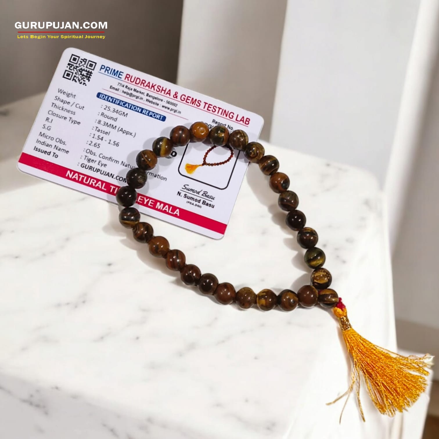 Tiger Eye Mala 27+1 beads made from natural Tiger's Eye stones, featuring 8MM beads for wrist wear, ideal for jaap and meditation practices.