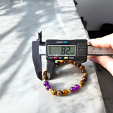 Tiger Eye and Amethyst Bracelet with 8mm polished beads on a white background, stretchable and lab certified