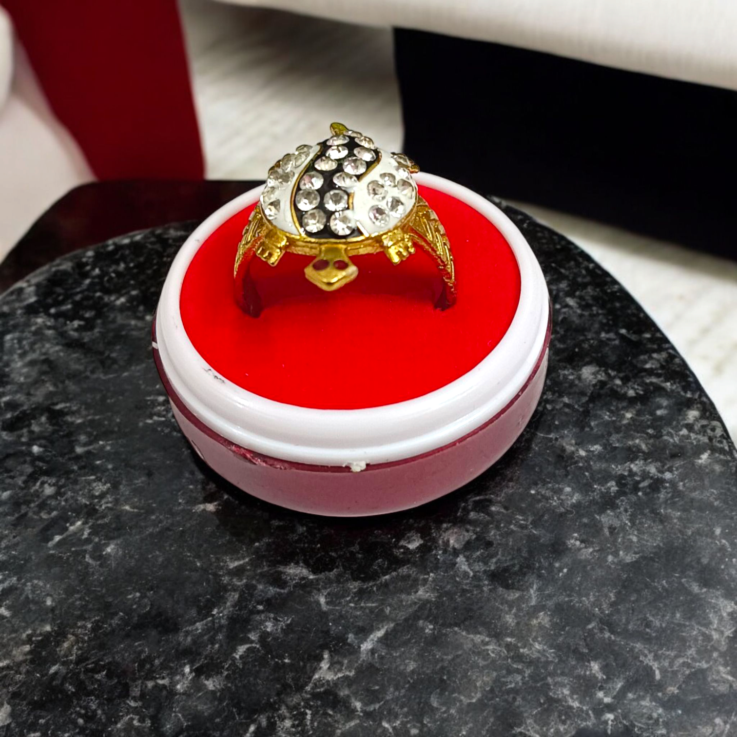 Tortoise Ring made of silver and brown with a stylish design and zircon diamond accents.