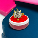 Tortoise Ring made of silver and brown with a stylish design and zircon diamond accents.